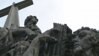 Granite Sculptures at the base of Valle de los caidos Catholic basilica and a monumental memorial 150-metre-high (500 ft) cross - Madrid Spain