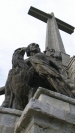 Granite Sculptures at the base of Valle de los caidos Catholic basilica and a monumental memorial 150-metre-high (500 ft) cross - Madrid Spain
